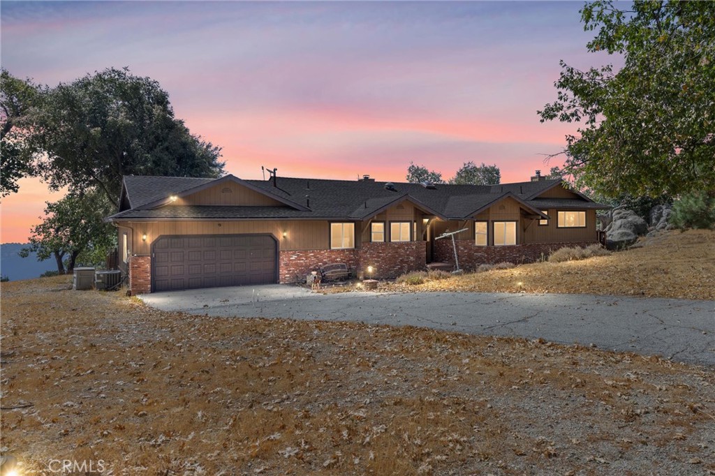 Undeniably breathtaking views of the San Joaquin valley from this stunning estate that’s nestled on the mountaintop within the prestigious Bear Valley Springs community. Located on over 2 acres of level to gently rolling lot, this remarkable, FULLY FURNISHED home swings open to a flowing open concept floor plan that is in "Pristine Condition" with 2310 square feet of living space that's bathed in natural light and has high vaulted ceilings, consists of 3 spacious bedrooms and 3 full bathrooms. Here are the few of the many fine features: Formal entry followed by a large open living room with skylight, centered around a brick cozy fireplace. The family's chef is going to truly appreciate the kitchen's abundant custom cabinets with LED counter lighting, granite countertops, the Island that will seat 4 guests, stainless steel appliances and newer stainless-steel refrigerator. The wet bar with wine cooler facing a huge area with the large dining table. Adjacent, followed through glass doors you'll step into the family room with its own fireplace, and direct access onto the wraparound deck with incredible views, perfect for entertaining your guests. This home features 2 separate master suites with their private bathrooms, both with his and her sinks, granite counters and oversized showers. Both master suits also have their own private decks offering a sanctuary of comfort and relaxation. The rear master suite also has a walk-in closet and wood burning stove for those chilly mountain nights. From a separate entrance outside there's a finished space perfect for a game room or extra storage. The entire home has been updated over the years with new ceiling fans, new windows and exterior doors, new hot water heater, and AC was added to keep you comfortable year-round. The 2-car oversized garage has a direct access through the laundry room. Outside you'll find plenty of usable space for all of your passion projects. A completely fenced garden area serves as the backyard of your oasis. enveloped by majestic oak trees that offer both shade and natural beauty. Starlink is already installed and running
