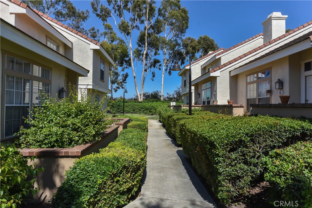 Spacious and light-filled largest end-unit 3-bed, 3-bath townhome in University Town Center’s Cambridge Court—just one block from nationally ranked University High School and walking distance to UC Irvine. Available now are an upstairs master suite with private bath and a main-floor bedroom with full bath. The home features an open floor plan with vaulted ceilings, hillside and tree views, and shared NEW kitchen, NEW flooring and family room with one roommate. Living room with fireplace adjoins the formal dining area, while the family room opens to the kitchen overlooking a private enclosed atrium. Enjoy a gated front courtyard, direct access to an oversized 2-car garage, and exclusive community amenities including pool, park, and tennis courts. Conveniently close to shopping, dining, entertainment, and world-class beaches.