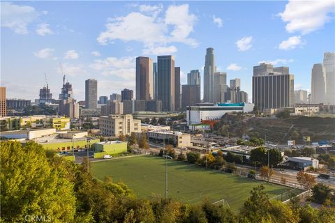 Photo of 117 N Toluca Street, Los Angeles, CA 90026 (MLS # GD25147721)