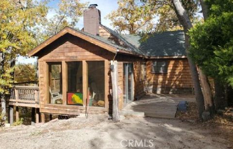 Photo of 33668 Angeles Dr, Green Valley Lake, CA 92341 (MLS # IV26000770)