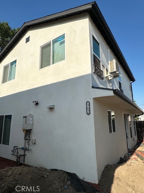 Completely remodeled and located on a quiet tree lines street in a beautiful pocket of Reseda. 3-bedroom, 2-bathroom home offering almost 1200 square feet of thoughtfully upgraded living space. Designed for those who value both style and substance, this residence seamlessly blends everyday comfort with elevated California living. Step inside to discover beautiful wood floors that flow throughout, setting the tone for a warm and polished interior. Kitchen is totally remodeled with Quartz countertops and loaded with new appliances. The open-concept layout centers around a sunlit interiors perfectly positioned for connection and conversation. Fresh paint, all-new hardware and updated lighting infuse each room with a contemporary touch, while abundant natural light enhances the home's bright and airy feel. Outside, the front-yard provides ample parking along with a serene greenery and gravel landscaping. With its prime positioning, generous outdoor space, and tasteful upgrades throughout, this home offers both privacy and presence in a peaceful, close-knit community.