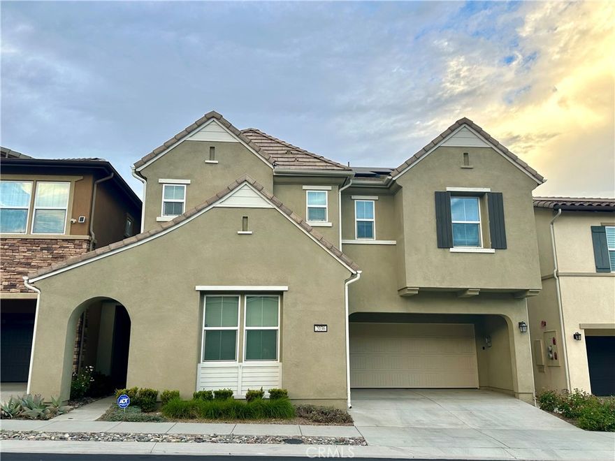 Spacious 5-bedroom, 4.5-bath SOLAR home in a newer North Chino Hills community. Open-concept layout with high ceilings and plenty of natural light. Large great room connects living and dining areas. Modern gourmet kitchen features a huge island, breakfast bar, walk-in pantry, quartz countertops, white shaker cabinets, and full backsplash.   Downstairs includes one bedroom with a private bath and a guest bathroom. Master suite with walk-in closet and en-suite bath. Three additional bedrooms, two bathrooms, a loft, and an upstairs laundry room with built-in cabinets and a sink offer added convenience.   Upgrades include custom tile work, elegant fixtures, and wooden-look flooring downstairs. All bathrooms are beautifully updated.   Two-car garage with extra driveway parking. Refrigerator, washer, and dryer included. Owner pays solar lease and HOA fees. HOA maintains the front yard, and the backyard offers low maintenance.   Prime location near shops, restaurants, parks, trails, and freeways. Excellent schools: Country Springs Elementary, Canyon Hills Junior High, and Ayala High.