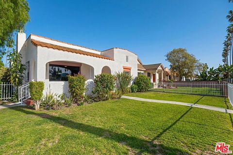 Photo of 5700 S Gramercy Place, Los Angeles, CA 90062 (MLS # 25607637)