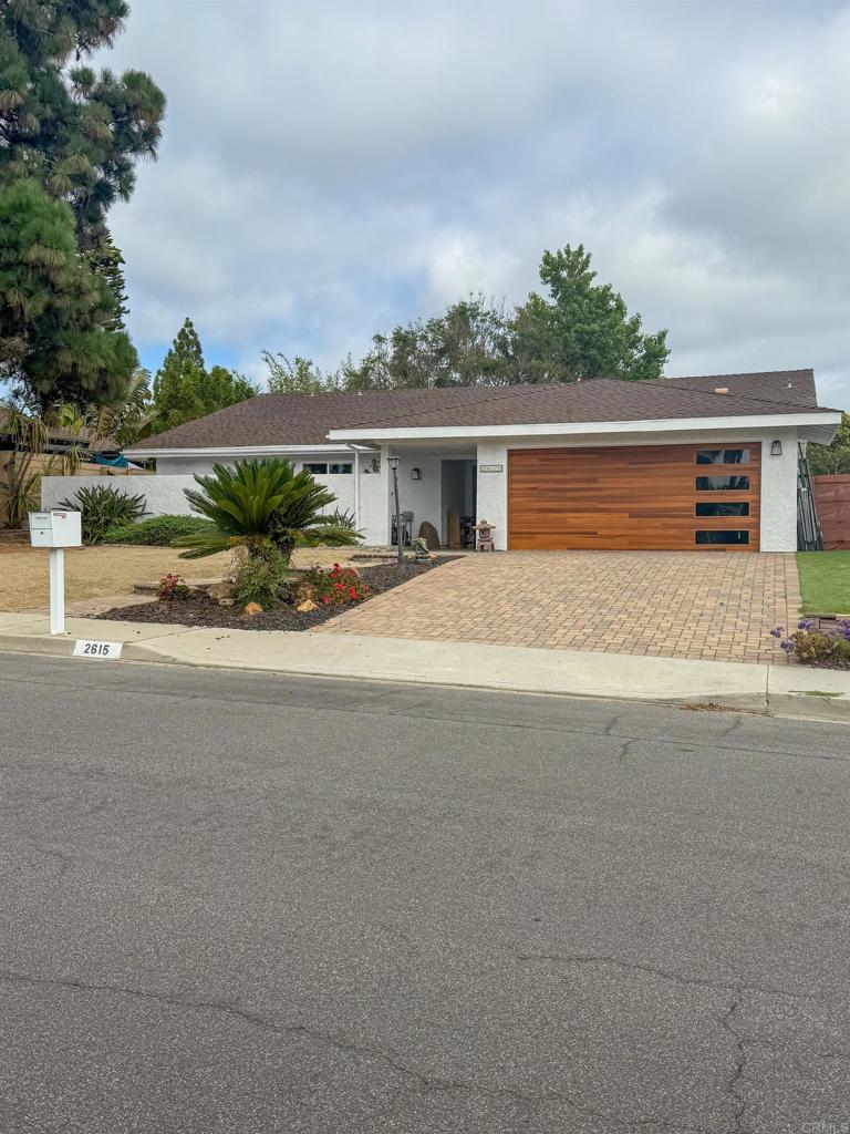 Single story home in the heart of Carlsbad! Nestled in an established residential neighborhood and on an oversized 1/4 acre lot. Spacious living areas, large dining area off the kitchen, and cozy brick fireplace with sunken seating lounge. Individual laundry room with washer/dryer included. New dishwasher. Recently painted exterior and new garage door. Updated bathrooms with modern fixtures. Whole house fan and ceiling fans throughout. Low maintenance landscaping. Located just minutes from top-rated schools, beautiful beaches, shopping at The Shoppes at Carlsbad, and an abundance of dining options. Easy access to I-5 and major commuter routes makes getting around a breeze. Pets considered on approval.