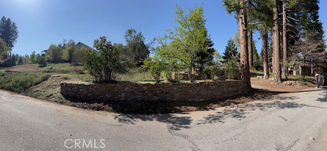 Discover a rare opportunity to build your dream mountain retreat at 2404 Whispering Pines Drive in the serene community of Running Springs! This vacant lot, nestled among towering pines, offers a blank canvas for your custom home or cabin in the heart of the San Bernardino Mountains. Previously impacted by the 2007 Slide Fire, this parcel has been cleared and is ready for redevelopment, providing a unique chance to create something new in a well-established neighborhood. The only thing remaining on the property is two stone retaining walls and the paved driveway and drive-up.
• Lot Size: 5440
• Location: Conveniently located just off Highway 18 and the 330, with easy access to local amenities like Stater Bros. Markets, Lake Arrowhead Brewing, and the Lakefront Tap Room Bar and Kitchen. Enjoy proximity to outdoor recreation, including Lake Arrowhead, Dogwood Campground, and Pali Mountain Conference Center.
• Utilities: Utilities are available at the street (buyer to verify availability and costs with local providers).
• Features: sloped lot with paved access, surrounded by a quiet, wooded neighborhood. Ideal for a custom home or vacation property, offering a peaceful retreat just 1.5 hours from Los Angeles.
• The lot has been cleared, and buyers are encouraged to conduct independent investigations regarding environmental conditions, hazard zones, and development costs.
• Running Springs is a sought-after mountain community with a competitive real estate market (homes sell for ~1-2% below list price, pending in ~26-54 days, per Redfin data). This lot offers great upside potential for builders, investors, or those seeking a personalized mountain escape.
( Seller is owner agent)