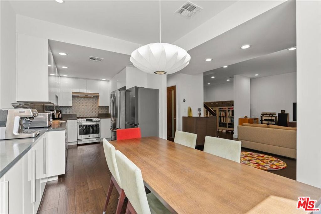 Updated townhouse in the desirable Verdugo Woodlands area of Glendale. On the main floor you will find updated kitchen with stainless steel appliances and dining area with access to the private patio. Off of the living room with cozy gas fireplace is a flexible space that could be used as a home office, den, or children's play area. Updated guest half bath is conveniently located on the main floor. On the second floor you will find 2 sizable bedrooms each with it's own updated en-suite full bath. Laundry is conveniently located on the second floor. Community amenities feature pool, spa, gated secure parking, and 2 side by side assigned parking spaces. Close to markets, great schools, parks, and shopping. HOA fee includes water, trash, and earthquake insurance.