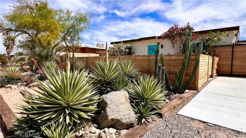 Photo of 74885 Serrano Dr Dr, 29 Palms, CA 92277 (MLS # JT26088529)