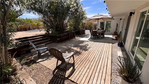 Photo of 74885 Serrano Dr Dr, 29 Palms, CA 92277 (MLS # JT26088529)