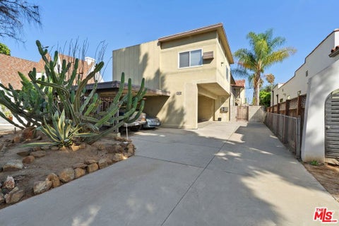 Photo of 1642 S Orange Drive, Los Angeles, CA 90019 (MLS # 26898321)