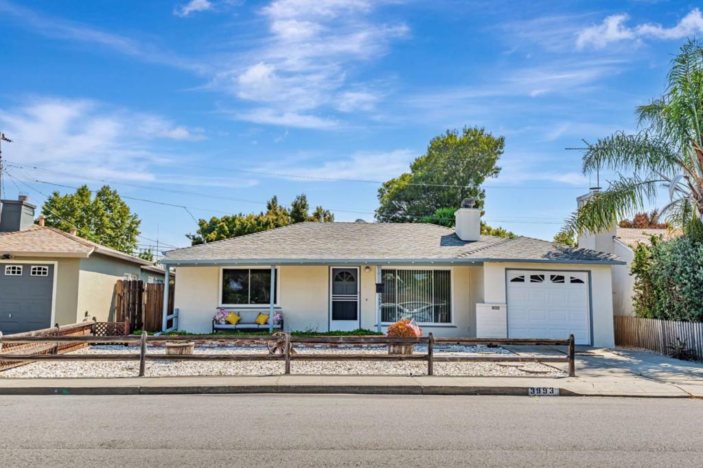 Welcome to this delightful 3-bedroom, 1-bathroom home nestled in the heart of San Mateo Village. With 1,080 square feet of thoughtfully designed living space, this residence seamlessly combines classic charm with modern updates and a community-oriented lifestyle. The freshly painted interior brightens each room and complements any style. The floor plan is efficient yet inviting, with a welcoming living room that centers around a cozy wood-burning fireplace. Double-pane windows throughout. The kitchen is equipped with stainless steel appliances and durable tile countertops. Double-pane windows throughout. The formal dining room is located adjacent to the kitchen. It opens to a spacious enclosed porch that can be utilized as a sunroom. The full bathroom features a shower-over-tub combo and a skylight that fills the space with natural light. Step outside into a fully fenced backyard. A beautiful wooden deck creates the perfect setting for barbecues, dining al fresco, or simply lounging under the sun. A tranquil rock fountain adds a serene touch. Prolific Orange tree. Attached garage with laundry area, including washer and dryer. Located within the highly rated San Mateo-Foster City Elementary School District. Close to shopping and transportation.