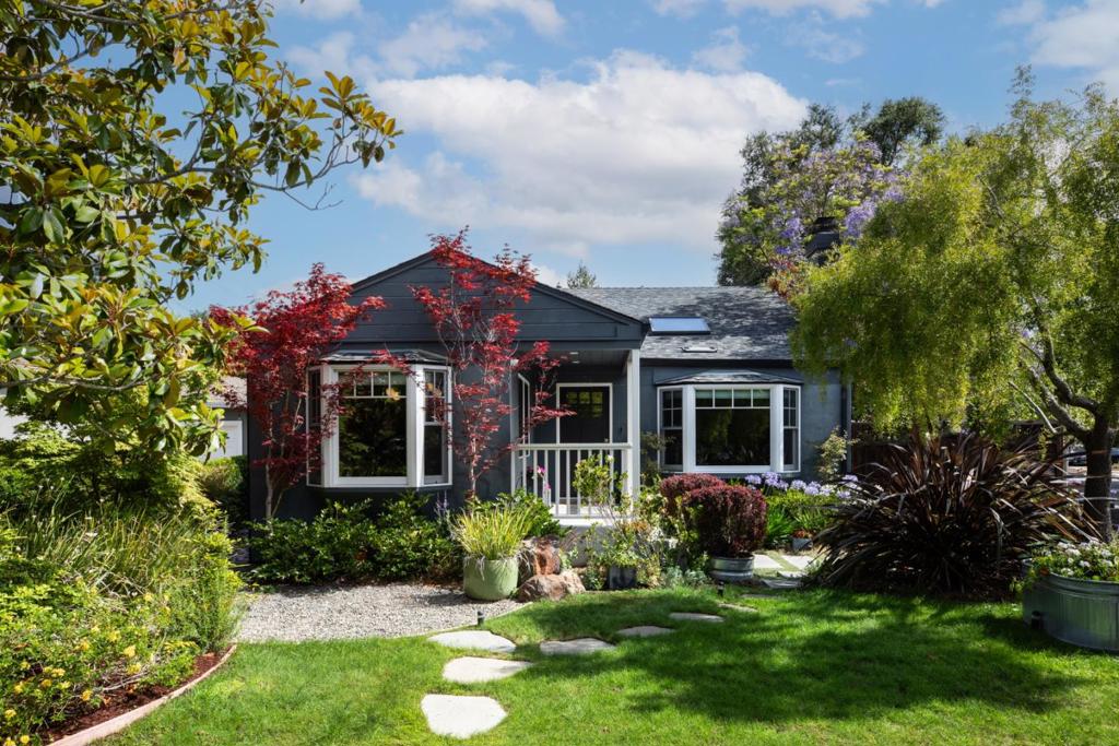 Stylish Retreat in Desired Menlo Park. Move-in-ready! This home sits on a generous corner lot and is the perfect blend of style, functionality, and comfort. Bright interiors, bay windows, and a skylight fill the home with natural light, enhancing its architectural charm. The open-concept floor plan seamlessly connects the living room, dining room, kitchen, breakfast bar, and built-in service bar, ideal for entertaining or everyday living. Three spacious bedrooms and two updated bathrooms, hardwood flooring throughout, a Lutron lighting system, and custom drapery for a refined touch. The garage has been thoughtfully transformed into a custom 2-in-1 gym and parking space, complete with recessed lighting, a portable A/C unit, and an EV charger, allowing for form and function without compromise. Serene, thoughtfully curated landscaping with Japanese maples, apple and lemon trees, blueberries, grape vines, and a blooming rose bed creates a lush, private garden retreat. Easy access to Highway 101, Palo Alto, Stanford University, Meta (Facebook), and top-rated Menlo Park schools. Minutes from the newly redeveloped Flood Park, featuring expansive open space, sports fields, playgrounds, and picnic areas perfect for recreation and family enjoyment.