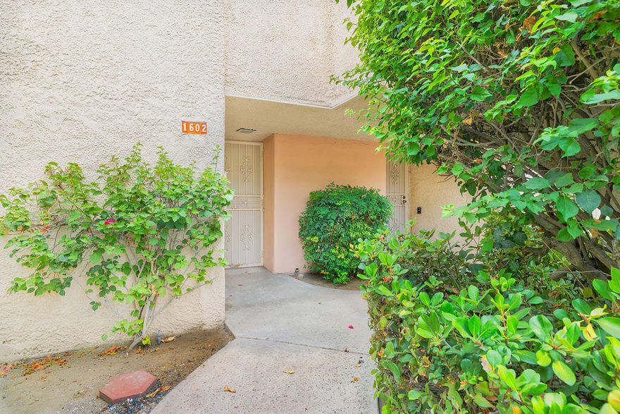 Recently renovated from top to bottom, this first floor home features all-new drywall, fresh paint, new cabinetry and sleek countertops, recessed lighting, and ceiling fans throughout. The fully tiled interior includes a modern kitchen with stainless steel appliances and soft close drawers, two bedrooms each with their own private bathroom, and three private patios to enjoy the sunshine.You own the land at Versailles. Community amenities include four swimming pools, two tennis courts, and covered parking. HOA dues cover water and trash service. Conveniently located close to shopping, dining, casinos, and all the fun that Palm Springs has to offer.