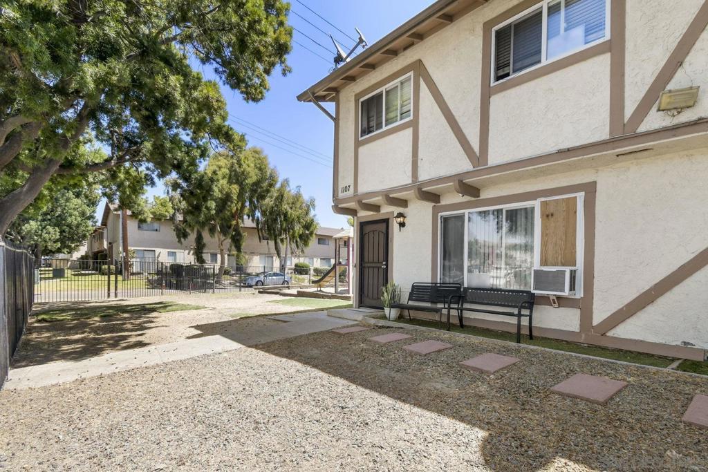 Value range $350,000-$400,000. CASH ONLY! Well-Maintained & Upgraded Townhome – Move-In Ready! Step into this beautifully maintained and upgraded unit, where pride of ownership shows throughout. As you enter through the front security screen door, you're welcomed into a bright living room filled with natural light, tile flooring, and baseboards with additional storage under the stairs. The open-concept kitchen and dining area has been tastefully upgraded, featuring quartz countertops, a decorative backsplash, and recessed lighting. A ceiling fan is thoughtfully placed over the dining space for added comfort. Modern appliances include a refrigerator and dishwasher, and dual-pane sliding glass doors lead out to your private back patio — perfect for relaxing. A renovated half-bath is located on the main floor for added convenience. Upstairs, you'll find wood laminate flooring throughout, creating a clean and cohesive look. The full bathroom offers granite countertops and dual sinks and modern finishes. Both bedrooms feature mirrored closet doors, and the spacious primary bedroom includes a walk-in closet. Additional highlights include in-unit washer/dryer hookups and the convenience of being located right next to the community playground — ideal for families or enjoying some outdoor time. This home combines style, upgrades, and functionality in a great location — don’t miss it!