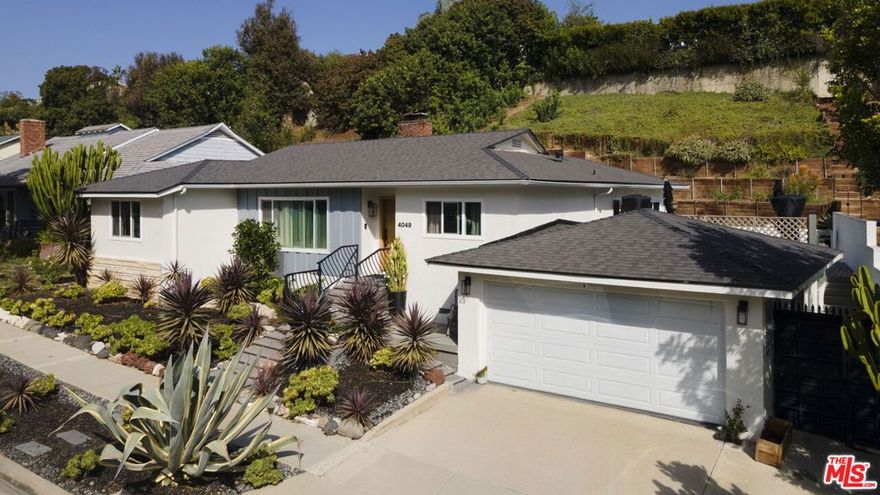 Discover the allure of this beautifully updated contemporary home for lease in the coveted View Park neighborhood. This residence blends original charm with modern conveniences, featuring stunning hardwood floors throughout and a spacious living room with a cozy fireplace and expansive windows that flood the space with natural light. The dining room, which shares a dual-sided fireplace with the living room, seamlessly flows to a large, updated kitchen. Equipped with granite countertops, stainless steel appliances, an island with breakfast bar, ample cabinetry + storage, and a pantry, the kitchen is perfect for both casual meals and entertaining. This home offers three bedrooms and two well-appointed, updated bathrooms, showcasing sleek, modern touches. Step outside to the backyard oasis, complete with a Trex deck, a sparkling heated pool and spa, and treetop views. Whether you're lounging, dining al fresco, or entertaining, this backyard is the ultimate space for relaxation and enjoyment. Situated in one of Los Angeles' most desirable neighborhoods, this home is just minutes from Reuben Ingold Walking/Jogging Park and local hotspots like Somerville, Hilltop Coffee + Kitchen, and Jon & Vinny's. Additionally, it's conveniently located near the upcoming Stocker Creative development, a vibrant hub set to offer boutique retail spaces, curated dining, art installations, and community-focused green spaces. With easy access to Kenneth Hahn Park, the Expo Line, and the Crenshaw/LAX Line, this property truly embodies the essence of Los Angeles living at its finest.