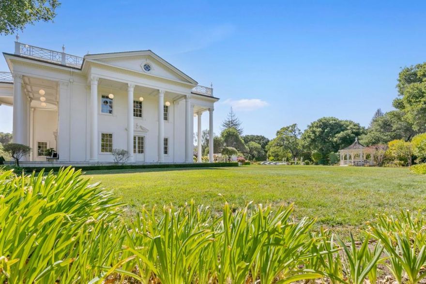 This property ranks among the region's finest legacy estates. This neoclassical Georgian Colonial embodies 2.9 acres of sprawling manicured grounds and boasts an open floor plan perfect for family living and entertaining. Gated entry, fountains, trees and hedgerows embrace the property for the ultimate in private entertaining, and an expansive mosaic motorcourt affords ample parking for guests. Triumphant columns open to sprawling lawns, the rose garden and ivy arches surrounding the pool, bathhouse, gazebo & solar array. Unmatched in pedigree & amenities, this estate truly magical