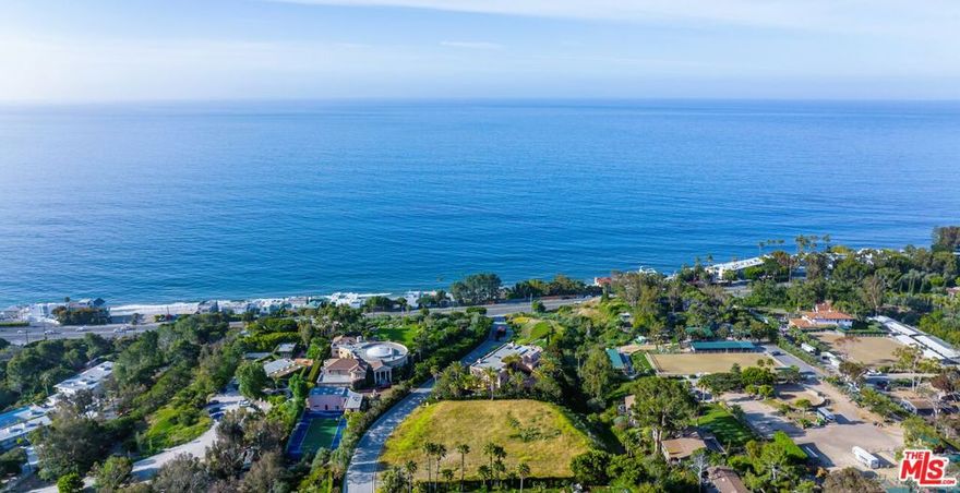 A rare opportunity to create your own Malibu coastal compound within the prestigious, guard gated LaMer community, an enclave of only eight estates with no HOA. This approximately 1.27 acre flat lot offers sweeping ocean views and direct private beach access for you and your horses without ever crossing PCH. The property comes with Coastal Commission vesting for previously approved (but expired) plans and permits for an 11,000+ sq. ft. estate and garage with a pool and tennis or pickleball court, streamlining the path to bring your dream to life. The lot is already graded with utilities on site and is zoned for horses, farm animals, and a garden perfect for envisioning your own "Malibu Farm" lifestyle. Step outside your future home with direct access to miles of hiking and riding trails with breathtaking scenery. All of this privacy and tranquility is just minutes from Pepperdine University, Little Dume, Paradise Cove, Point Dume Village, Cross Creek, Whole Foods, Zuma Beach, Trancas Country Market, and more. This is more than a vacant lot; it's a once in a lifetime canvas to build a legacy estate in one of Malibu's most coveted private settings. Bring your vision and make it your own.