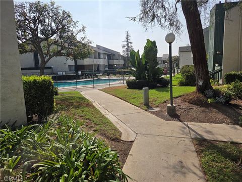 Photo of 15213 Santa Gertrudes Avenue #W106, La Mirada, CA 90638 (MLS # DW25250853)