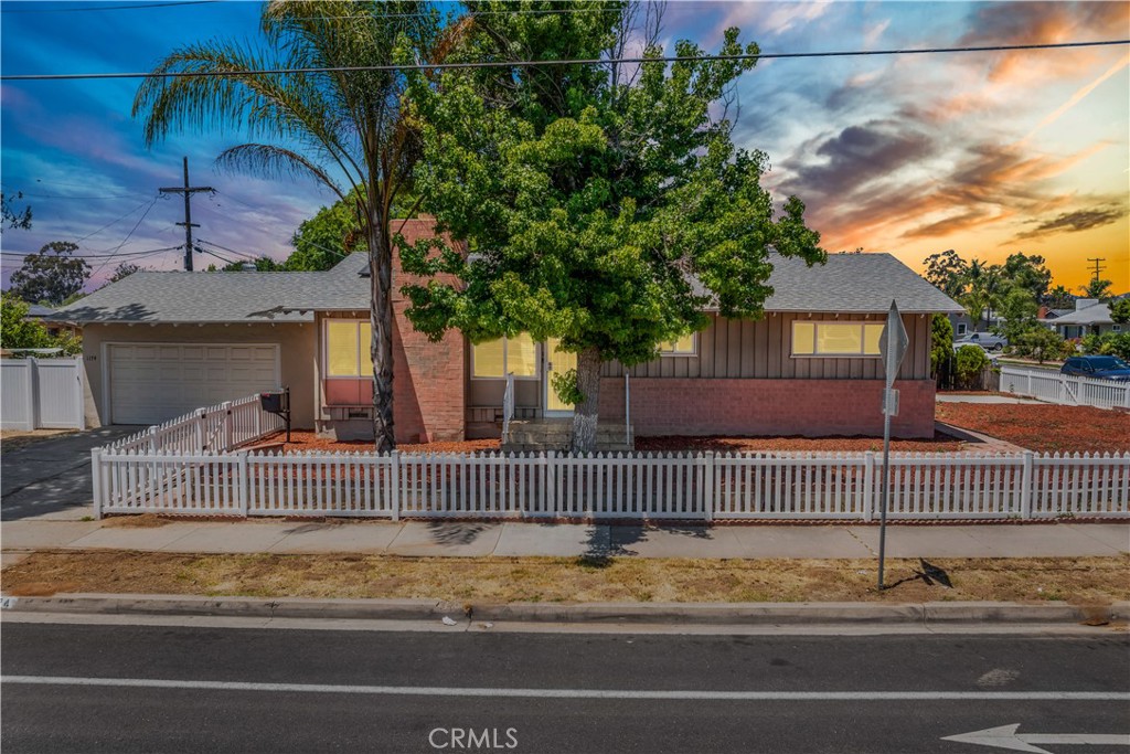 Welcome to this inviting 3-bedroom, 2-bath home on a spacious lot in El Cajon! With an open floorplan, this home offers comfortable living and great flow—perfect for busy families. The living room features a cozy fireplace, and you'll love the solid surface countertops throughout the kitchen and bathrooms. The primary suite includes dual sinks and a walk-in shower for a spa-like retreat. Easy-care wood and tile flooring run throughout the home.
Step outside to a large lot with endless potential—mature trees in the front yard, plus grapevines and a fruit-bearing orange tree add charm and character. The covered patio provides a great space for outdoor dining or relaxing, and there's plenty of room to design your dream backyard—add a pool, garden, or play area! The oversized driveway and additional parking are perfect for an RV, boat, or guests.
Located close to top-rated schools, military bases, shopping, dining, and all the best San Diego has to offer. This is a fantastic opportunity to create your ideal home in a prime location!