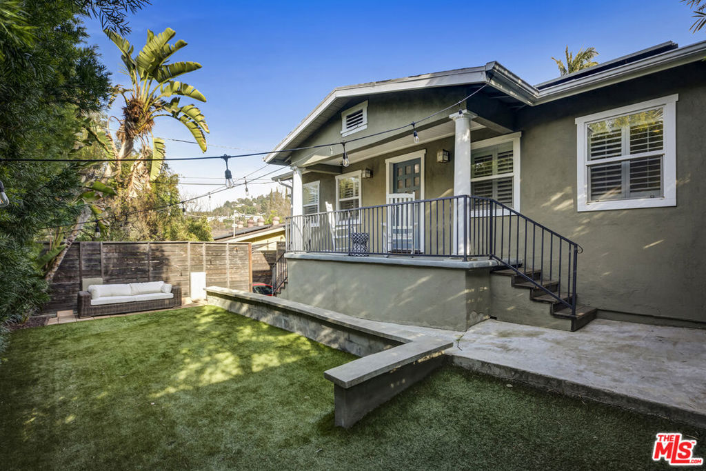 Discover this modern, fully furnished California bungalow + separate 200 sq ft guest house. Private oasis with views, this charming home is perfectly updated for contemporary living. Nestled on a spacious terraced lot in the hills of Glassell Park, the residence sits on a quiet, tree-lined street. Step inside to find a tastefully renovated interior featuring a master suite with an en-suite bathroom, dual closets, a bright eat-in kitchen boasting Carrera marble counters, and brand-new stainless steel appliances. One of the bedrooms is utilized as a media room and one is set up as an office. The living room is equally inviting, highlighted by a custom tile mantel and hearth, with ample bonus storage and a finished one-car garage completing the practical layout. One of the bedrooms is utilized as a media room and one is set up as an office. Outside, enjoy multiple unique spaces that provide beautiful views of Eagle Rock and Glendale. Apple HomeKit enables a smart home, allowing control of lighting, exterior gates, and other hands-free features. The home comes with central a/c and heat and solar panels. The separate office, studio, or guest house offers an ideal workspace for creatives. Located just minutes from the vibrant bars and restaurants of Glassell Park and Eagle Rock, with quick freeway access (2, 5, and 134) ensuring easy commutes to Silver Lake/Echo Park, Pasadena, and Downtown in just 5 to 10 minutes this property is perfectly positioned for both comfortable living and convenient urban access. Dogs ok. Available August 1, 2025.