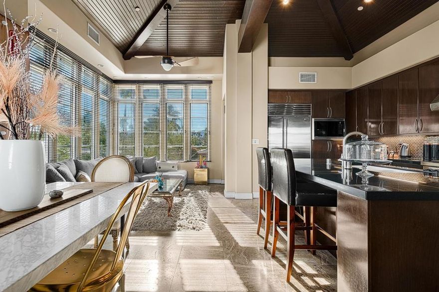 Take Your Palm Springs Getaway to the Next Level.Nestled in the exclusive St. Baristo enclave of the Historic Tennis Club, this vibrant carriage house condo is all about living with style, ease, and energy. With two bedrooms, a flexible bonus room, three baths, a private garage, and an extra covered parking spot, it's ready for anything--daily life or weekend escapes.Crisp, spacious living spaces flow effortlessly beneath dramatic ceilings, flooded with natural light and radiating a loose, relaxed vibe. The main living area opens to a generous patio, perfect for sunrise coffee, sunset cocktails, or starlit desert evenings.The entire third level is exceptional: the primary suite feels like your personal desert retreat, complete with a cozy fireplace and private balcony. Lounge, entertain, or simply soak in the serene mountain and city vistas--this is where mornings feel inspired, evenings feel electric, and every moment reminds you that Palm Springs living is meant to be celebrated.