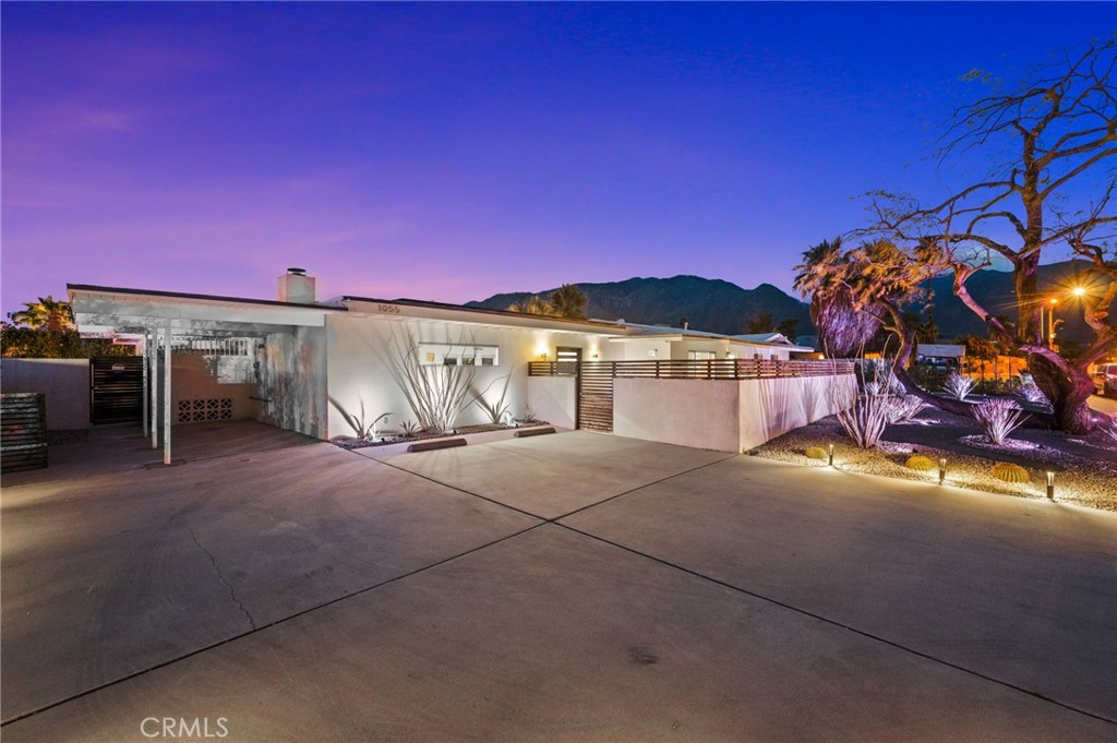 Resort-Style Living in Beautiful Palm Springs, CA
Welcome to your private oasis in the heart of Palm Springs—where modern design meets resort-style comfort. Step through a custom front door into a beautifully updated home featuring a sleek, contemporary kitchen complete with stainless steel appliances, eye-catching backsplash, recessed lighting, and tile flooring that flows seamlessly through the kitchen, dining, and living areas.
The living room boasts a grand fireplace and custom paintwork with elegant accent walls that bring warmth and personality to the space. Both bathrooms are tastefully remodeled with exquisite tile work, modern fixtures, and separate temperature controls for your comfort.
French doors open to your stunning backyard retreat, perfect for entertaining or relaxing in style. Enjoy a sparkling pool with loungers, swaying palm trees, a mini-golf area, covered patio, built-in BBQ, and cozy fire pit—everything you need to live the ultimate desert lifestyle.
This home’s modern, sleek design must be seen in person to be fully appreciated. Don’t miss your chance to own a slice of paradise in Palm Springs!