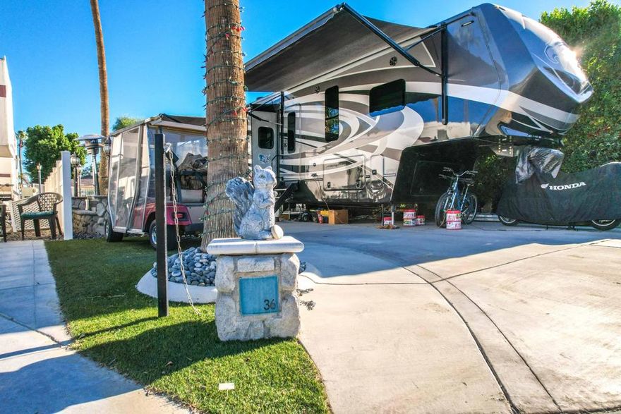 Seize the opportunity to acquire a pristine, turn-key RV package on a beautifully situated interior lot. Enjoy ultimate convenience with this location near the front of the resort, ensuring effortless entry and exit, and its position adjacent to Satellite A for quick access to amenities. The centerpiece of this offering is a luxurious 2019 Luxe Gold RV, presented in absolutely pristine condition. This high-end motorhome is ready for immediate enjoyment, allowing you to seamlessly begin your Palm Springs desert lifestyle.  Outdoor Resorts Palm Springs is a Five Star RV Resort Community combining luxury with affordability. It is a guard gated resort that sits on 137 beautifully landscaped acres with 27 holes of executive golf, 10 tennis courts, 13 pickleball courts, 8 swimming pools, a fully equipped fitness center, sports bar, beauty salon/barber shop, full-service restaurant, 2 club houses, activities, special events and so much more.