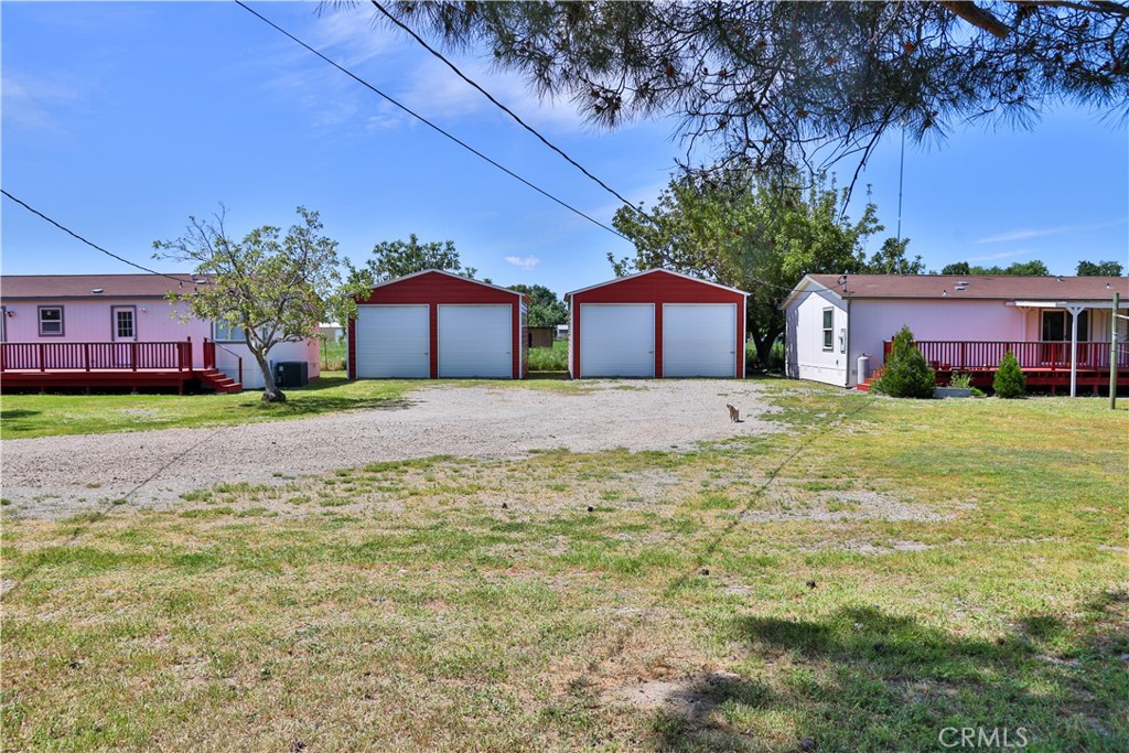 What a great property, welcome to this 17 acre find at 19360 & 19362 Simpson Rd. Brand new coat of paint make these homes look great. Located 10 minutes away from downtown Corning . Featuring two, YES two registered manufactured homes. A spacious 4 Bedroom 2 bath well taken care of 1836 square foot clean home. With an open floor plan and a huge living room. The second home is also very well taken care of 3 Bedroom and 2 bath with 1080 Square feet of living space and a new roof on patio porch. Each with their own septics, and separate meters , and utility services. Both homes share a well. Both homes have their own wood porches to enjoy views of mountains and sunsets. Each home has its own two car garage with plenty of storage space. This property would be ideal for horses or farm animals. Abundant quail,wild turkey, and dove are some of the animals you will find in this beautiful property. Access to Thomes Creek from the back area, ideal for a day picnic or going on a kayak ride. Book a viewing and see the potential in this property.
