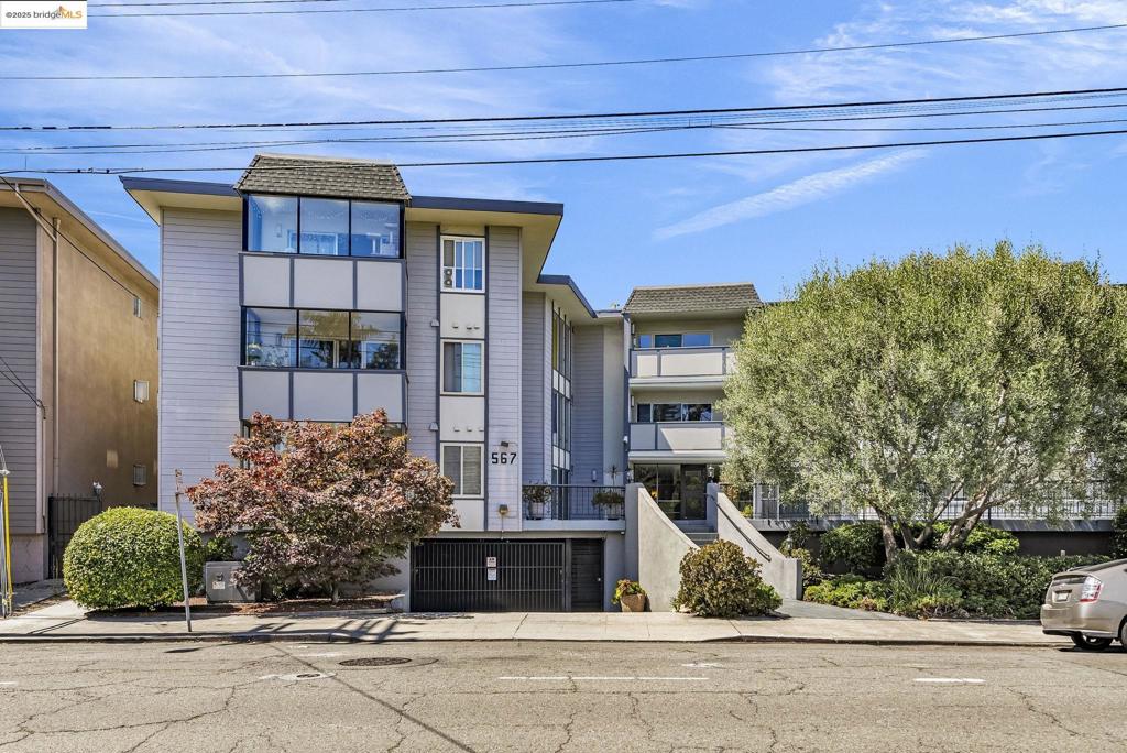 Move-In Ready Commuter's Dream in Prime Oakland Location! Perfectly nestled between two of Oakland's most vibrant business districts, this updated 2-bedroom, 2-bathroom condo offers the ideal blend of modern comfort and unbeatable convenience. Interior Features: • Spacious modern open-concept layout with gas fireplace - Large enclosed patio perfect for relaxing or entertaining • Primary bedroom with walk-through closet and updated en-suite bathroom • Ample closet space throughout • Move-in ready condition Building Amenities: • Secure building with elevator access • Garage parking included • In-building laundry facilities • Well-maintained common areas Unbeatable Location: Located in the heart of the Grand Lake District, you're just steps from Oakland's best offerings: • Piedmont Avenue: Coffee houses, shops, restaurants, bars & cinema • Short walk to Morcom Rose Garden and Lake Merritt • Grand Lake Theater for entertainment • Trader Joe's, Peet's Coffee, and Whole Foods nearby • Transbay bus and rideshare access just one block away This is truly a commuter's dream - whether you're heading to San Francisco or exploring all that Oakland has to offer, everything you need is at your doorstep. Don't miss this opportunity to own in one of Oakland's most desirable