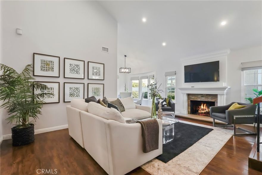 Stylish four bedroom townhome, featuring high ceilings, quartz countertops, dual pane windows, solid core doors, stainless steel appliances, interior laundry, HVAC, and an oversized attached 2 car garage. This home blends modern comfort with timeless style, offering a welcoming space for family, entertaining, or quiet relaxation. Living in Woodbridge means embracing one of Irvine’s most coveted lifestyles. With 22 community pools, scenic North and South Lakes, and a network of trails perfect for walking, jogging, or biking, every day offers the chance to enjoy the outdoors. Tennis and pickleball enthusiasts will appreciate the private clubs, courts, and a fully stocked tennis pro shop, while social gatherings and neighborhood events make it easy to connect with your community. Imagine weekend mornings fishing or boating on the lakes, afternoons at the pool, and evenings enjoying lakeside picnics or strolling through tree-lined paths. Woodbridge offers a vibrant mix of recreation, relaxation, and community connection, where neighbors become friends and every season brings something to enjoy. From recreation and leisure to convenience and comfort, this home offers it all, a place to live, play, and thrive in one of Irvine’s most sought after neighborhoods. Don’t just buy a home, invest in a lifestyle that celebrates both modern living and the unparalleled Woodbridge experience.