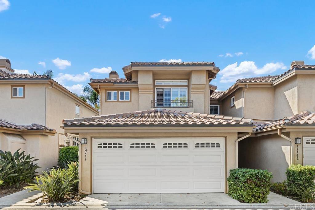 Perfectly positioned right in the heart of the prestigious Carmel Valley, this beautiful turnkey home blends sophisticated finishes with everyday practicality, offering a rare combination of luxury and prime living. Nestled in a highly sought-after community with pool and tennis amenities, this stylish Mediterranean/Spanish-inspired residence offers 3 bedrooms, 2.5 baths, and 1532 sqft of open, contemporary living space. After going through the private gated entry and upon entrance into the house, you will see the main living area on your left, showcasing the cathedral ceiling, wide-plank oak flooring, Italian stone fireplace, and refined crown moldings and upgraded baseboards. Chef's kitchen on the further right, with Thermador gas range and hood, GE Profile refrigerator, rich granite countertops, high-end cabinetry, and travertine tile flooring with custom mosaic accents -- perfect for entertaining or family meals. Outside, the private back yard offers tranquil outdoor space with stone patio and lush landscaping -- ideal for relaxing evening or intimate gatherings. Upstairs you will find the spacious primary suite overlooking the private back yard, complemented by a custom walk-in closet and a beautifully updated bath with marble tile finishes. Additional two bedrooms share a well-appointed Jack-and-Jill bathroom. Other features include: a convenient downstairs half-bath, attached 2-car garage with laundry, central A/C, forced air cooling/heating, and ceiling fans -- all designed for comfort and convenience. Plus a newly installed roof in June 2025. Community features: community pool, spa, playground, and tennis courts, all with low HOA and Mello-Roos fees. This home is also just a short stroll from top-rated schools (Carmel Creek Elementary, Carmel Valley Middle and Torrey Pines High), libraries, parks, shopping, dining and quick access to I-5 and the coast and beaches. Don't wait -- schedule a viewing today!