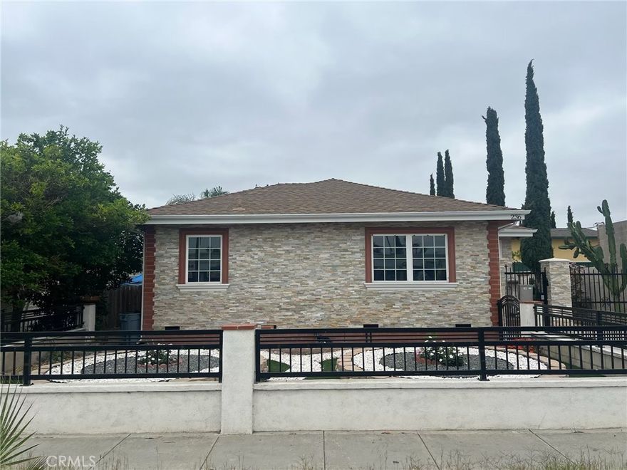 The most surprising feature of this home is how quiet it is inside considering you are right off Tustin Avenue. This is is a pride of ownership home. Updated inside and out a! Stack stone clad exterior, double paned and well insulated windows make the home very quiet and peaceful. Enter the home from the front and you are greeted with a true foyer. The home has a second door as you enter the home and when you walk in be ready for "Wow". Living room, dining room and kitchen are all open floor plan. Beautiful kitchen with newer cabinetry, soft close and roll out drawers, lazy Susan's, granite counter top, all newer stainless steel appliances! There is a breakfast bar and an eat in kitchen. Engineered wood floors, arched doorways, 2 full baths with walk in showers. Lots of natural light! Windows all have wood shutters and crown moulding valance above all large windows are an added detail. Recessed LED lighting throughout. There are smaller closets so this may not be a fit for every family. Fruit trees line the side yard with citrus fruits. Exit the home onto a covered patio meant for relaxing and entertainment! The detached garage is just adjacent and is where the laundry is located with lots of storage! The long drive way ends where there is an additional storage shed (owner will retain for private use) and plenty of parking! You will have plenty of space for guests here! Close to shopping, eateries, groceries and quick access to Santiago Creek Trail for walking, running or biking plus easy freeway access!