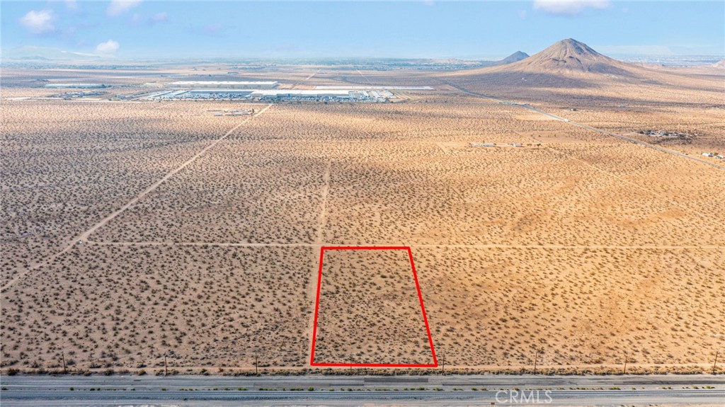 Don’t miss this nearly 3-acre, level lot situated just four parcels north of the corner of Dale Evans Parkway and Quarry Road in Apple Valley. The property has power available right at the street and water access at the rear on Tecaya Road, with a proposed sewer line planned for Quarry Road. It is zoned under the Specific Plan, which allows for industrial uses (buyer to verify).
This site is ideally located near the planned ±1.2M sq. ft. industrial facility on Quarry Road and just 2.8 miles from the Walmart and Big Lots distribution centers. APN: 0463-441-04-0000.
Brightline West has already acquired land in the newly annexed Dale Evans Parkway corridor for its future high-speed rail station that will connect Southern California to Las Vegas, with construction anticipated to begin soon and operations projected to start by 2026.
Additionally, the seller has granted the Town of Apple Valley a 33-foot easement for a new infrastructure project. This will bring a paved road with underground electric, sidewalks, gutters, and fire hydrants—adding further value and accessibility to the property.