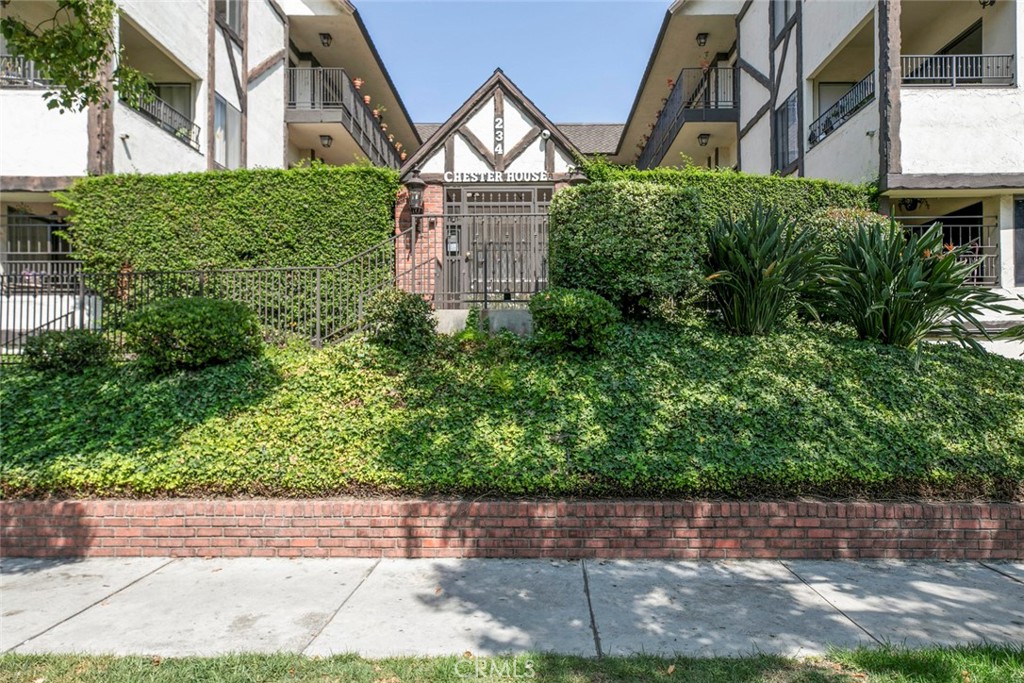 This turnkey 2-bedroom, 2-bathroom condo in the heart of Glendale offers 1,215 sq ft of beautifully updated living space, combining modern finishes with comfort and convenience. The spacious open-concept layout features a bright living room with recessed lighting and a cozy fireplace, a sleek contemporary kitchen with stainless steel appliances, and a dining area that opens to an enclosed balcony. Both bedrooms are generously sized, with the primary suite boasting a stylish dual-sink vanity and walk in closet. The unit includes a washer and dryer, two side-by-side parking spaces with extra storage in the garage, and access to a charming landscaped courtyard. Small pets are welcome, making it a perfect home for both individuals and families seeking a move-in-ready space in a desirable location close to shops, dining, and entertainment.
