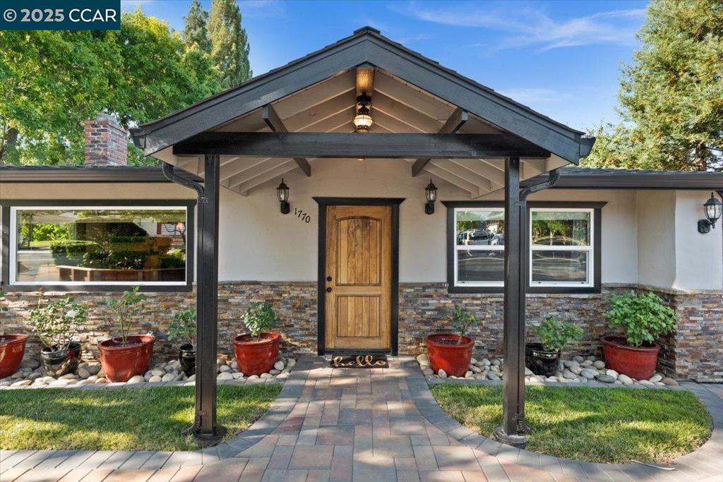 One-of-a-kind, single-level property in Walnut Creek’s coveted Larkey Park neighborhood offers endless possibilities on a spacious .31-acre lot. With over 3,300 sq ft of total living space, the compound includes a beautifully updated 3-bed, 2-bath main home (~1,341 sq ft), a detached modern cabana or office (~261 sq ft), a separate 1-bedroom apartment with private entrance and parking (~617 sq ft), and a fully finished, livable garage (~1118 sq ft). The stunning backyard oasis features a custom pool, redwood decking, elegant brick hardscape, hot tub, outdoor shower, garden area, and lush lawn. Topping it all off is an oversized 4-car carport—perfect for extra vehicles, a workshop, or recreational use. Walking distance to the amazing Larkey Park and convenient access to freeways, BART, shopping and vibrant Downtown Walnut Creek. A truly rare and versatile property you won’t want to miss! Perfect for multi-generational living, work from home, large extended family, rental income - So many possibilities. See video tour at 17703rdAve.com