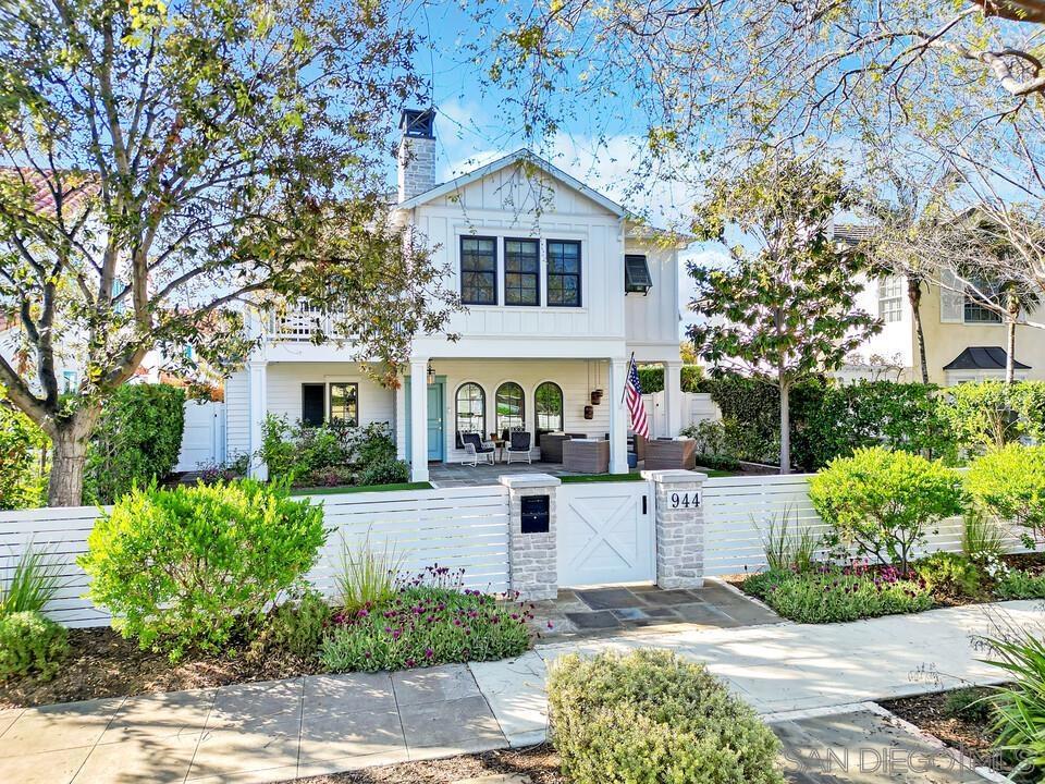Exquisite Custom-Built Coastal Beach House in Coronado Village Nestled in the heart of Coronado, this breathtaking custom-built beach house by Cavannah Construction, with interior design by McCormick and Wright (sold furnished), offers an unparalleled living experience just blocks from the famous Coronado beach and within walking distance to Coronado Village’s charming shops and restaurants. Situated on a sprawling 7,000 square foot lot, this residence offers a 3 bedroom+ /3.5 main home plus a detached 1 bedroom/1 bathroom guest house. The epitome of coastal elegance, blending sophistication with relaxed Southern California living. Welcome to this exquisite custom-built coastal beach house, crafted by the esteemed Cavannah Construction and elegantly designed by McCormick and Wright. Nestled on a generous 7,000 square foot lot, this stunning property is just a few blocks from Coronado's world-renowned beach and within walking distance to the charming shops and restaurants of Coronado Village. This residence features a seamless open floor plan that epitomizes Southern California living, effortlessly connecting the indoor and outdoor spaces. With 3 bedrooms, a versatile bonus room, and 3.5 bathrooms in the main home, plus a detached guest house with 1 bedroom and 1 bathroom, this home is perfect for both relaxation and entertaining. The gourmet kitchen is a chef's dream, boasting a spacious quartzite island, custom cabinetry, and top-of-the-line appliances, including a Wolf range, Sub Zero refrigerator, and wine fridge. A walk-in pantry provides ample storage for all your culinary needs. The property includes a serene master suite adorned with soft hues, fireplace, and vaulted ceilings. Step onto the lovely covered balcony featuring a charming bed swing, while the spa-like master bathroom offers dual vanities, a soaking tub, and a large shower with exquisite marble and custom tile finishes. Two additional bedroom suites and an open media/bonus room are located upstairs, along with a convenient laundry room equipped with two stackable washer/dryer units and custom cabinets for additional storage. Step outside to the beautifully landscaped backyard, complete with a custom door system that opens to a covered patio featuring a fireplace and overhead heaters. The outdoor gourmet kitchen with a wrap-around bar is perfect for al fresco dining, and the covered hot tub offers a luxurious escape. The detached guest house provides a private retreat for visitors, complete with a living area and refrigerator. Additional amenities include a three-car garage with epoxy flooring, custom cabinetry, and an electric charger, as well as an outdoor shower and a dedicated dog run. This home truly embodies the ultimate Coronado lifestyle, blending luxury, comfort, and sophistication. Don’t miss the opportunity to make this stunning property your own.