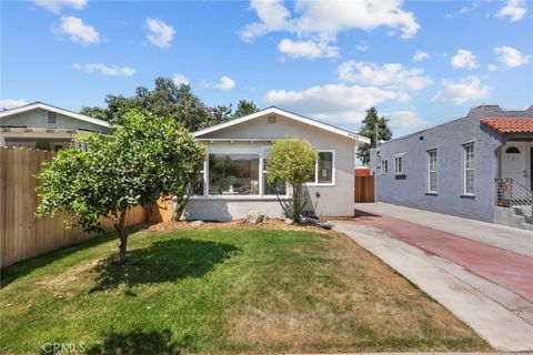 Photo of 3705 S St Andrews Pl, Los Angeles, CA 90018 (MLS # OC26144131)