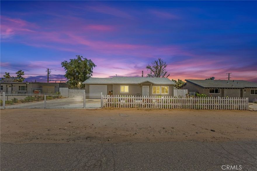 This charming 3-bedroom, 1.5-bath home is located in a quiet, established neighborhood. Enjoy a beautifully landscaped front yard with a fenced entry and a long concrete driveway — perfect for extra parking or RV potential. Inside, the home features tile flooring throughout, dual-pane windows, and a spacious indoor laundry/bonus room. The kitchen offers plenty of cabinet space, cherry oak finishes, and a modern backsplash. Step into a large backyard with a covered patio and mature trees — perfect for gatherings, kids, or your dream garden. Comfortable, clean, and move-in ready. Come see it for yourself!