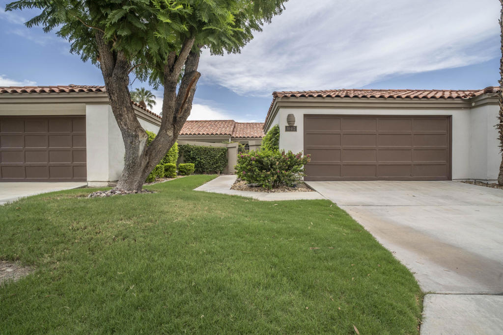 Located on the 11th fairway of the Palmer Private course, this beautifully remodeled home showcases the highly sought-after Champion 2 floor plan. Spacious and well maintained, it offers plenty of room to embrace the PGA West lifestyle, with a versatile area ideal for a playroom, office, or guest space.Flooded with natural light, the home also features a thoughtfully converted garage now used as a game room. Detached from the main house, it connects through a charming private patio -- a perfect spot to relax or entertain with family and friends.Just steps from the community pool, this property blends comfort, convenience, and panoramic golf course views. Don't miss the opportunity to own this true gem at PGA West!
