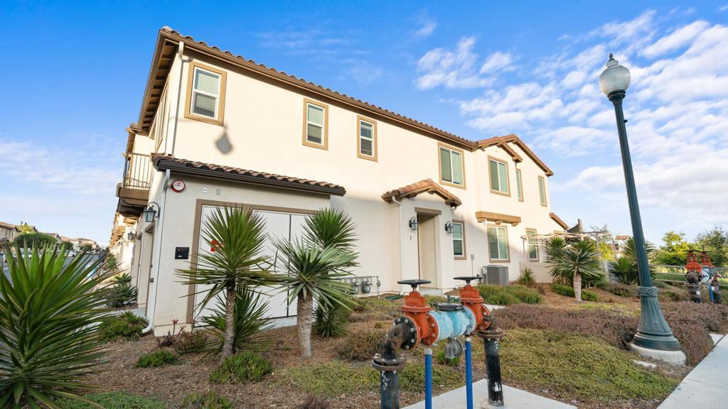 Welcome to 1206 Biltmore Place #1, a stunning 2-bedroom, 2-bathroom corner-unit townhome in the heart of Chula Vista’s vibrant Otay Ranch community. This home offers a perfect blend of modern sophistication and cozy comfort, ideal for professionals, small families, or anyone seeking a low-maintenance, high-style home in a prime location. Both bedrooms are generously sized, each with its own en-suite bathroom for ultimate privacy and convenience. The primary suite is a serene retreat, complete with a walk-in closet and a spa-like bathroom, while the second bedroom offers flexibility for guests, a home office, or a cozy den. In-unit laundry and a one-car attached garage add practicality to this stylish home, which is move-in ready with a freshly maintained interior. As part of the Parc Place community, you’ll enjoy resort-style amenities, including a sparkling pool and spa, pickleball and tennis courts, basketball courts, children’s playgrounds, BBQ areas, a gym, and a recreation center. The landscaped putting greens are perfect for family fun or sharpening your golf skills. Located just steps from top-rated schools. This home is also near shopping, dining, and easy access to highways 125 and 805 for seamless commuting. Priced competitively, this 2-bedroom en-suite townhome is a rare find in Otay Ranch. Don’t miss your chance to own this modern gem. Schedule a tour today and experience the perfect blend of luxury, convenience, and community living!