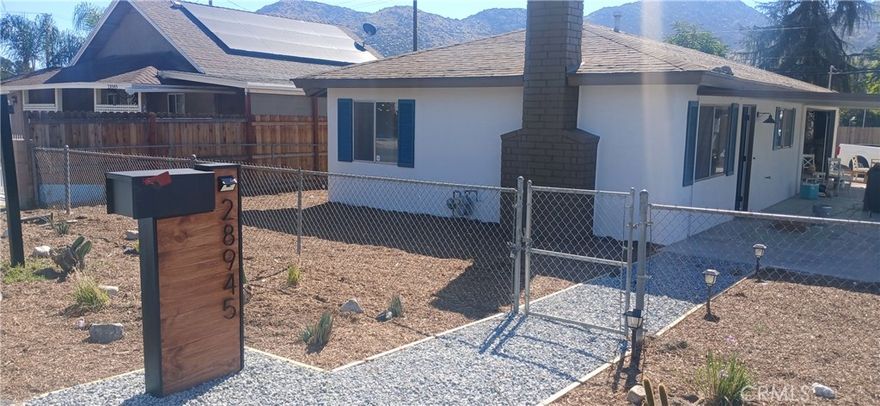 Welcome! to this cute bundle of joy! This 2-bedroom 1 bath fully renovated home! offers a brand-new kitchen wrapped in beautiful quarts counter tops, gorgeous tiled backsplash, moderns plumbing fixtures and of course brand-new stainless-steel appliances. The new wood flooring throughout with modern baseboards that gives the home that modern feel we all love, updated lighting, modern garage door with quite motor! in a 2-car attached garage, the home is cooled by a brand new mini split system for those hot summer nights but provides great heat for those upcoming winter days.  The yard space is one you won't find anywhere. There is plenty of room for RV parking, Boats, and still can add and ADU for any future home projects! You must hurry because this home won't last!