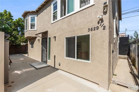 Photo of 3629 W 58th Place, Los Angeles, CA 90043 (MLS # SB26217293)