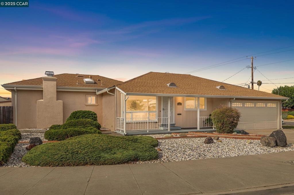 Welcome to easy living in the heart of San Leandro’s Bonaire neighborhood—a tight-knit pocket where neighbors chat on evening walks, kids play freely in front yards, and every street hums with neighborly charm. This spacious ranch-style home offers room to grow and thrive. Step into oversized living and dining areas that flow seamlessly, with warm hardwood floors stretching beneath sunlit spaces. Just beyond, the inviting family room—anchored by a charming stone fireplace—sets the stage for movie marathons, cozy game nights, or lounging. The open floorplan flows into a massive eat-in kitchen—ready for your culinary adventures or a creative revisioning. Entertain with ease or unwind in style—indoors and out. Slide open the door to a beautifully hardscaped wraparound yard featuring mature Lemon and Pomegranate trees. Whether it’s weekend barbecues, morning coffee, or twilight gatherings, there’s space to live, host, and savor every moment. The home’s private wing offers three light-filled bedrooms and a full bath, creating a peaceful retreat with room to personalize. A second full bath near the main areas adds comfort and convenience for guests. Lovingly cared for by one family for decades, this home holds a legacy of memories—and now, it’s ready for yours.