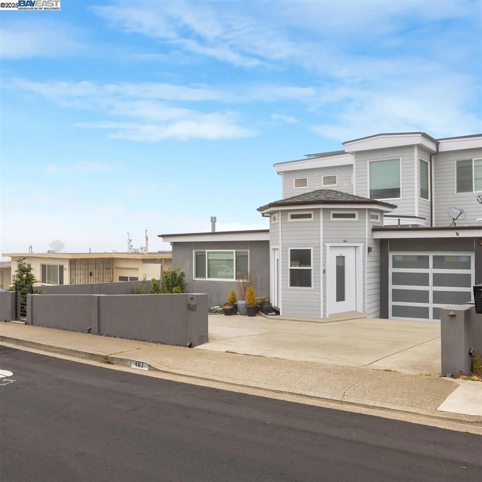 Experience sweeping ocean vistas from the kitchen, dining room, and backyard—and wake up each morning to breathtaking scenery from the primary suite. This 3-bedroom, 4-bathroom home offers 2,414 sq. ft. of modern luxury and was essentially rebuilt in 2016 (only one wall retained for permits). Nearly everything is new—foundation, framing, electrical, plumbing, finishes, solar, and more. Inside, you’ll find elegant details including a tiled foyer, recessed lighting, crown molding, detailed baseboards, dual-pane windows, and engineered hardwood floors. Each bedroom is a private suite with its own full bathroom—perfect for multi-generational living, hosting guests, or rental opportunities. The gourmet kitchen opens seamlessly to the living and dining areas, creating an ideal space for gatherings. Enjoy Pacific Ocean views, cozy movie nights with a built-in projector, and peace of mind with a premium security system. Additional highlights include indoor laundry, abundant storage, and carefully designed finishes throughout. Located just 2 minutes from Edgemar Park and close to beaches, hiking trails, shopping, and top-rated schools. With high-quality craftsmanship, a versatile layout, and unmatched coastal charm, this Pacifica property is truly one of a kind.