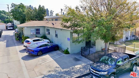 Photo of 7102 Hood Avenue, Huntington Park, CA 90255 (MLS # 26993203)