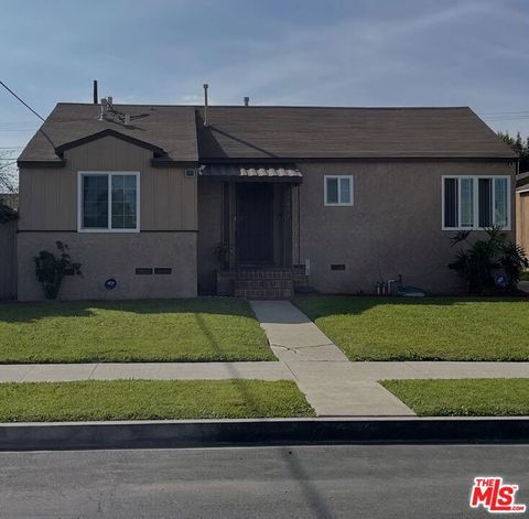 Photo of 11831 Orchard Avenue, Los Angeles, CA 90044 (MLS # 26660179)