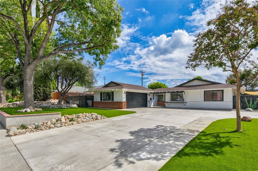 Welcome to this beautifully upgraded 3-bedroom, 2-bathroom home, perfectly situated in one of Claremont’s most peaceful neighborhoods. Offering modern updates inside and out, a spacious open layout, and an entertainer’s dream backyard, this property is move-in ready and designed to impress. With top-rated schools nearby, convenient freeway access, and close proximity to Claremont Village restaurants, shops, and the popular Claremont Hills Wilderness Loop, this home combines lifestyle and location in one.



As you pull into the expansive driveway. You'll notice the slick clean turf yard. As you walk to the front door and pass the electric car charger you will be greeted by a dutch door. Step inside to find a bright, open-concept living space where the renovated kitchen flows seamlessly into the dining and living areas—perfect for gatherings of any size. The kitchen boasts abundant storage and modern finishes, while both bathrooms have been stylishly updated. Throughout the home, durable faux wood tile flooring offers the beauty of hardwood with low-maintenance durability—ideal for busy families and pet owners. The private primary suite features a renovated bathroom and a walk-in closet, while two additional bedrooms provide flexibility for children, guests, or a home office. New windows and a whole house fan bring in natural light and energy efficiency.



The backyard sets this home apart. Fully renovated and designed for relaxation and entertaining, it features a built-in gas fire pit for cozy nights, a long turf play area for kids, a spacious grass lawn for pets, and a large driveway with parking for multiple cars. Gopher wire has been installed beneath the grass for protection and durability, ensuring the yard stays beautiful year-round.



The finished 2-car garage is a true bonus, featuring epoxy floors and recessed lighting. Whether you need extra parking, a home gym, or a private office, this versatile space expands your lifestyle options.



Beyond what meets the eye, the essential systems have also been modernized: the home’s plumbing has been updated, and the electrical panel has been completely replaced. Solar panels add additional efficiency and savings.



Homes of this caliber, with such extensive updates both inside and out, rarely become available in Claremont. Don’t miss the opportunity to make this bright, beautifully renovated property your next home