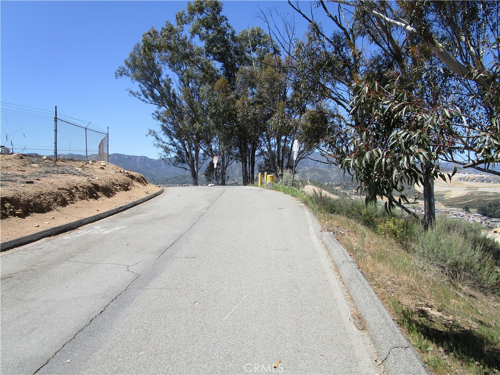 Unlock Your Dream Lifestyle: Build Your Oasis at 23 Country Club Heights
Imagine waking up to breathtaking views, the gentle breeze whispering through the trees, and the tranquility of a peaceful community. This is the promise that awaits you at 23 Country Club Heights, Lake Elsinore. This isn't just a plot of land; it's a canvas for you to paint the picture of your ideal life.
Prime Location: Situated in the desirable Country Club Heights area of Lake Elsinore, this property offers the perfect blend of serenity and convenience. You'll enjoy a peaceful, residential atmosphere while being just a short drive from the amenities that Lake Elsinore has to offer.
Potential for Your Dream Home: This lot provides a fantastic opportunity to build a custom home tailored to your exact needs and desires. Think spacious living areas, a gourmet kitchen, a luxurious master suite, and a backyard oasis perfect for entertaining or relaxation.
Lake Elsinore Lifestyle: Lake Elsinore is a vibrant and growing city with something for everyone. Outdoor enthusiasts will love the proximity to the lake for boating, fishing, and water sports. The surrounding hills offer opportunities for hiking and biking. You'll also find a variety of shops, restaurants, and entertainment options nearby.
Investment Potential: Land in desirable areas like Country Club Heights holds strong investment potential. Building a beautiful home on this lot not only provides you with a wonderful place to live but also a valuable asset for the future.
What You Can Build: While specific building plans will always need to be approved by the city and county, this lot offers the potential for a variety of home styles.
Imagine: A spacious single-family home: Perfect for families or those who love to entertain. Think open floor plans, multiple bedrooms and bathrooms, and ample outdoor living space.
A modern retreat: Design a sleek and stylish home that takes advantage of the views and provides a contemporary living experience.
A tranquil haven: Create a peaceful oasis with a focus on relaxation and privacy. Think lush landscaping, a swimming pool, and a spa-like atmosphere.
Country Club Heights is known for its: 23 Country Club Heights is more than just land; it's the foundation of your future. It's a chance to create a home that reflects your unique style and a lifestyle that you've always dreamed of.
This is your opportunity to create something truly special. Don't let it pass you by!