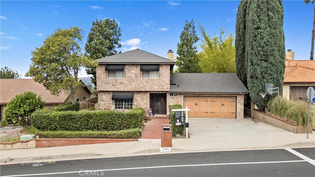 Welcome to a truly distinctive residence nestled in one of Diamond Bar’s most coveted neighborhoods. Freshly painted throughout, New Roof, this home radiates warmth, character, and timeless charm . all within walking distance of Diamond Bar High School, With a 10/10 school district rating, this location is second to none for families seeking top-tier education.
Step inside and be captivated by the chef’s dream kitchen, featuring:
• Solid cherry wood custom cabinetry
• Newer countertops
• Dacor 6-burner double oven range with hood
• Dacor warming drawer
Upstairs, the master loft retreat is a sanctuary of its own , complete with a cozy fireplace and panoramic views of the San Gabriel Valley city lights.
Step outside into a backyard oasis designed by renowned landscape artist John Greenlee. Whether you're hosting a lively gathering or enjoying a quiet Sunday breakfast, the flagstone patio, lighted winding path, and hillside garden with scenic seating areas create an enchanting outdoor experience with breathtaking views at every turn.
This home is a rare find — full of character, upgrades, and unbeatable location.
Title shows 3 bedrooms.