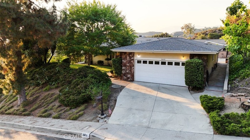 Discover your dream retreat in the heart of Glendale’s serene Glenoaks Canyon. This beautifully maintained 3-bedroom, 2-bathroom home offers the perfect blend of space, comfort, and spectacular views.
Step inside to find a generous layout featuring a large living room, a separate oversized family room, a formal dining area, and a spacious kitchen with its own breakfast nook. The primary suite boasts a walk-in closet and private bathroom with dual vanities, while two additional bedrooms share a well-appointed full bath with a stall shower.
Enjoy indoor-outdoor living at its finest with a sparkling swimming pool and sweeping views of the canyon and downtown Glendale—absolutely stunning at sunset and in the evenings. With a recently replaced roof
and a quiet hillside location, this home checks
all the boxes.