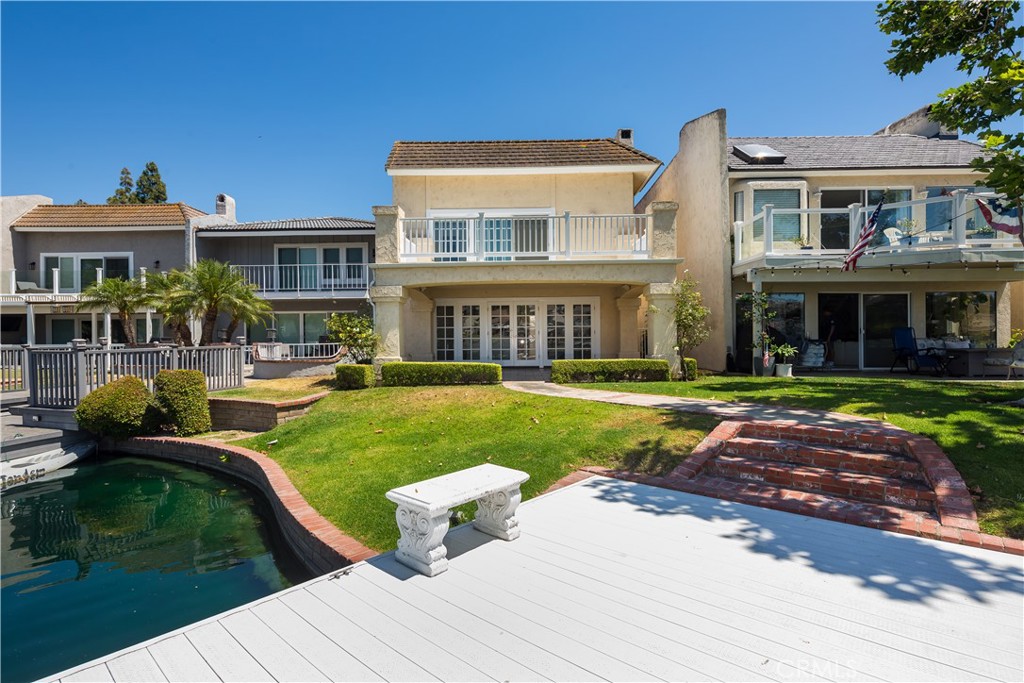 This ideal lakefront retreat nestled within a waterside inlet of the Lake Forest Keys Community offers charming water views and a truly unique lifestyle. The property's thoughtful design includes three bedrooms, two bathrooms, and a spacious great room that merges the home’s entertainment spaces into one cohesive area. The recently updated kitchen flows seamlessly into the living and dining spaces, creating a natural gathering spot for occasions and events. Outside, the beauty of waterfront life continues. A private dock capable of accommodating a 16-foot Duffy boat and radiant channel views provide a peaceful spot to relax and enjoy the tranquil surroundings. The community enhances this lifestyle with an impressive array of amenities, including a resort-inspired clubhouse just minutes away, whether by foot, car, or boat. Residents can indulge in multiple pools, a spa, a fully-equipped indoor gym, tennis and pickleball courts, a range of sports courts, and an exclusive bar and lounge. This properties offerings truly provide a novel way of living.